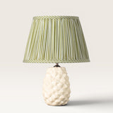 Api Lamp and Green and White Striped Lampshade