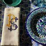 Embroidered white linen napkin